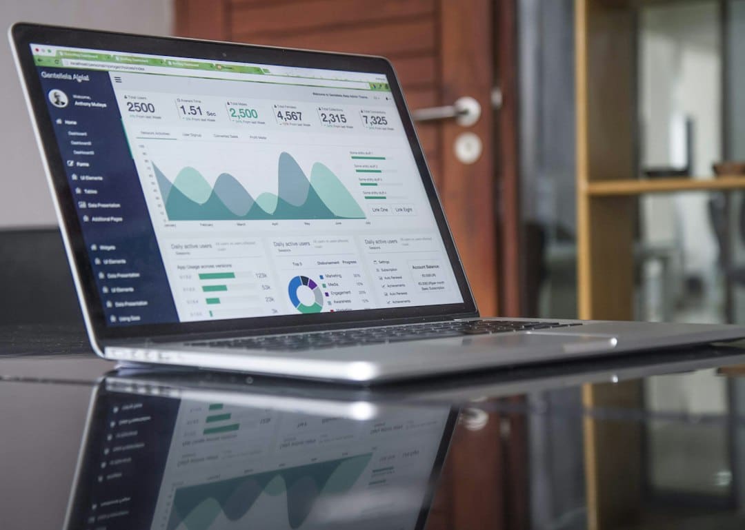 Laptop showing charts and analytics for digital content